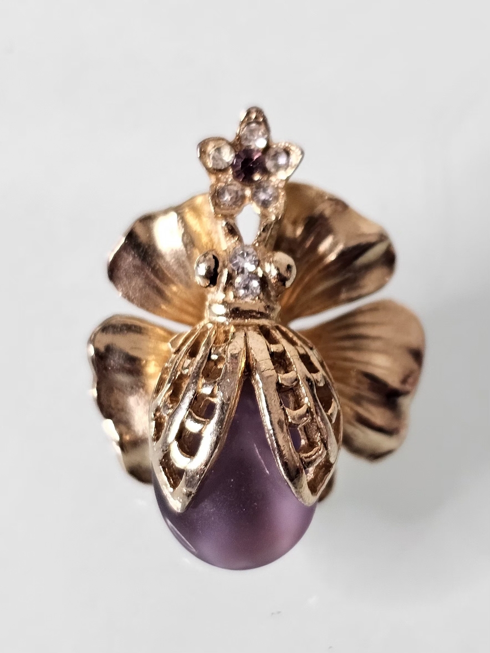 Gold-Tone Floral Bee Pendant with Purple Teardrop Stone